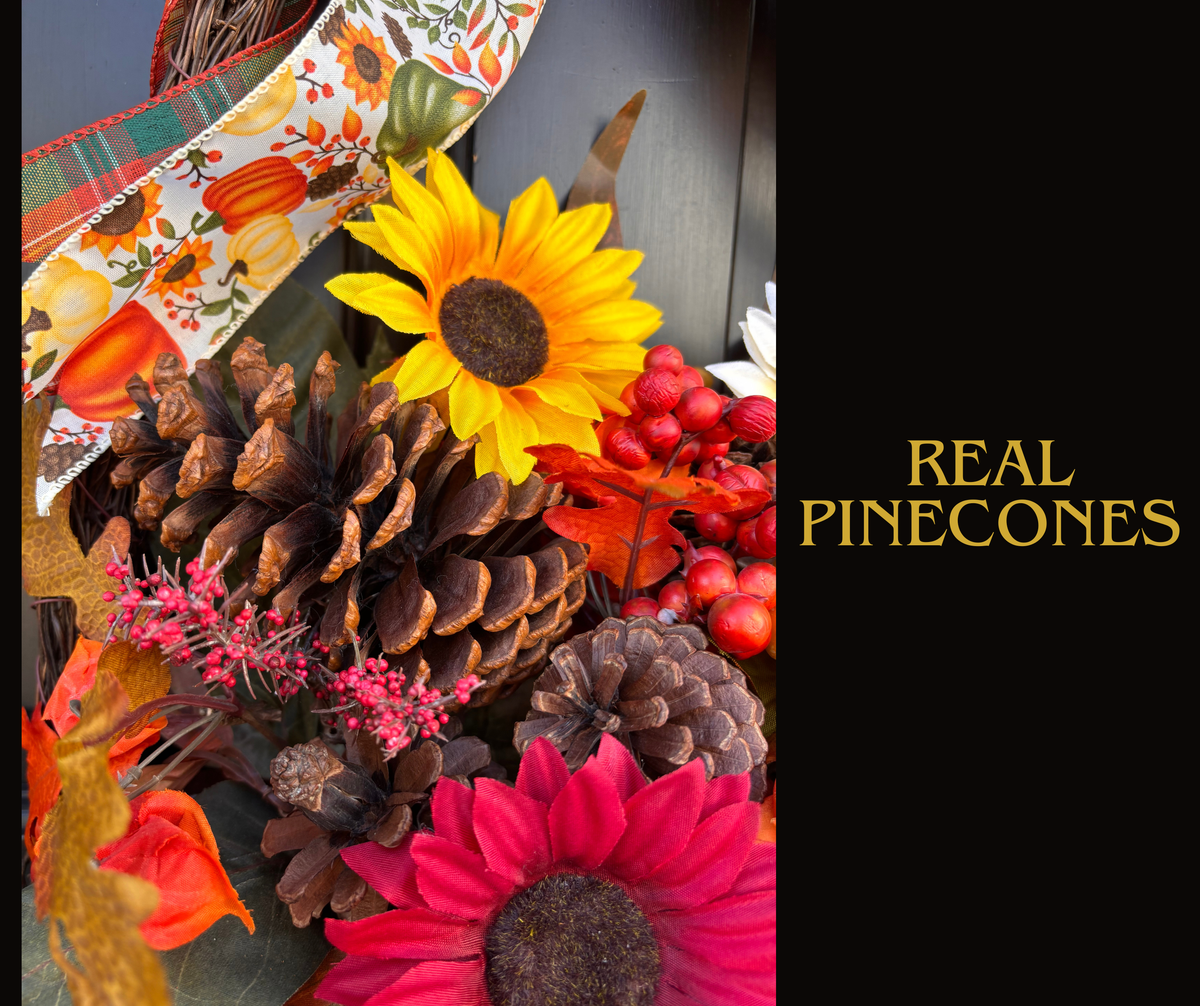 Close-up of real pinecones, a yellow sunflower, and red berries in the fall basket arrangement
